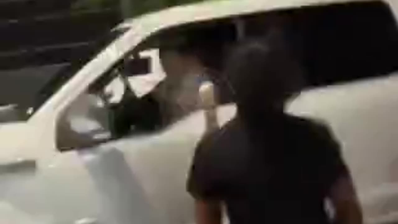 Driver rams car after being struck in the face during road rage altercation in Miami.mp4