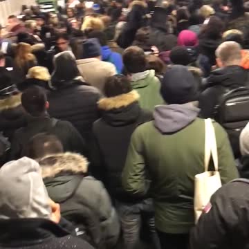 Crowded subway station local express
