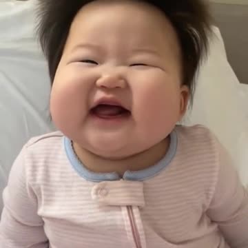 The Little toddler with an explosive head and cute smile