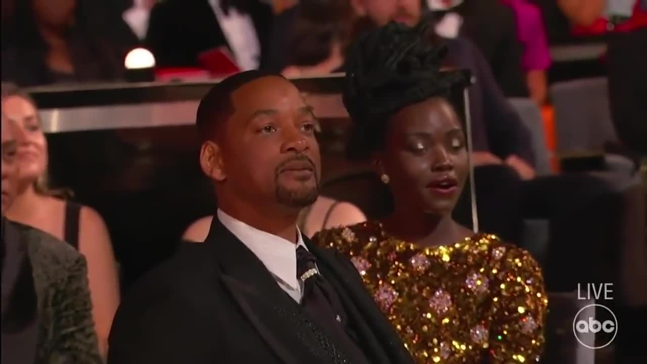 Will Smith punches Chris Rock after he jokes about his wife