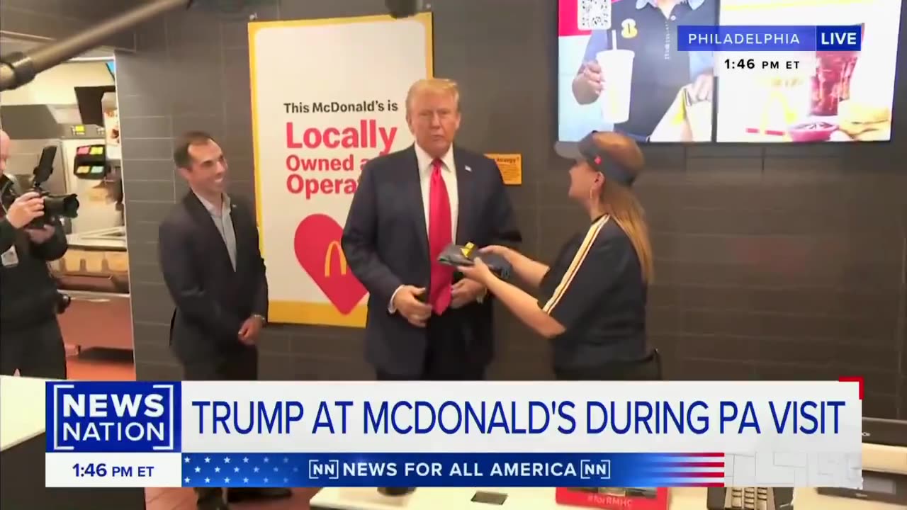 President Trump SUITS UP for his shift at McDonald's