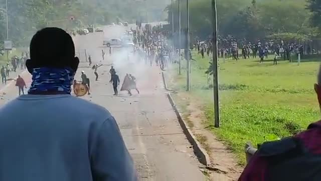 Armed citizens fire on rioters in Durban, South Africa.