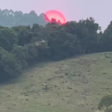 The Sun Setting In Front Of The Cloud Deck