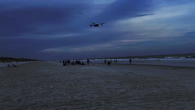 Drone flying at the beach