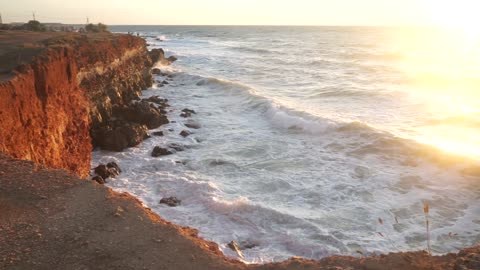 waves and sunset