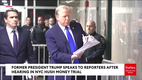 Trump Showcases To Reporters Huge Stack Of Stories He Says Condemn Hush Money Trial