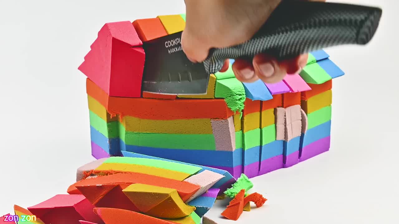 Rainbow house From kinetic sand cutting