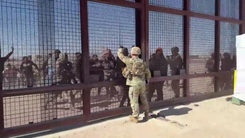 Migrants break barriers and rush border guards in shocking scene at El Paso