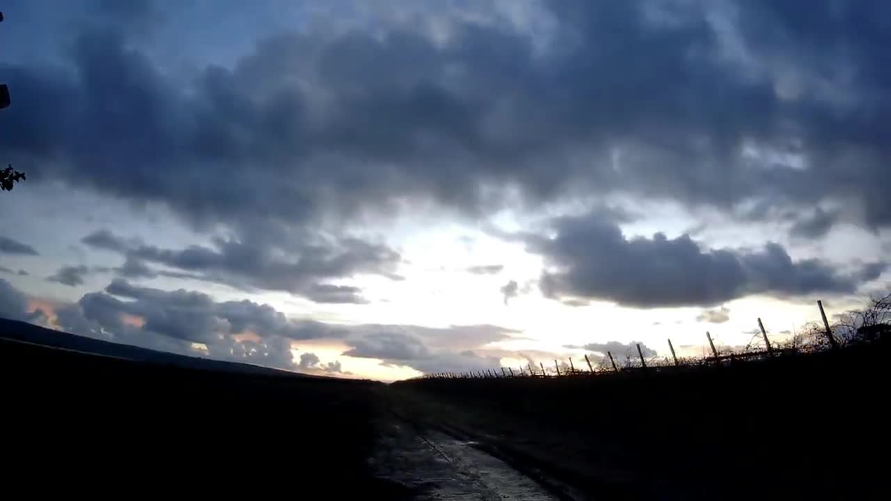 In the evening sky, blue sky and white clouds are clear. Natural beauty in the depths of mountains