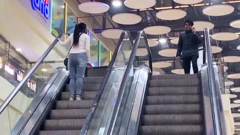 KISSING PRANK ON CUTE GIRLS ON THE ESCALATOR 😜|| ESCALATOR PRANK | EPIC REACTION