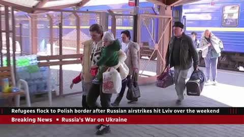 Refugees flock to Polish border after Russian airstrikes hit Lviv