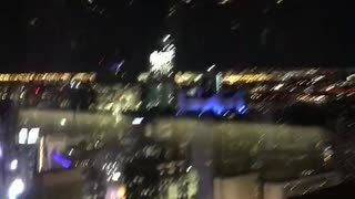 Overlooking the New York City Skyline at Night on a Manhattan rooftop