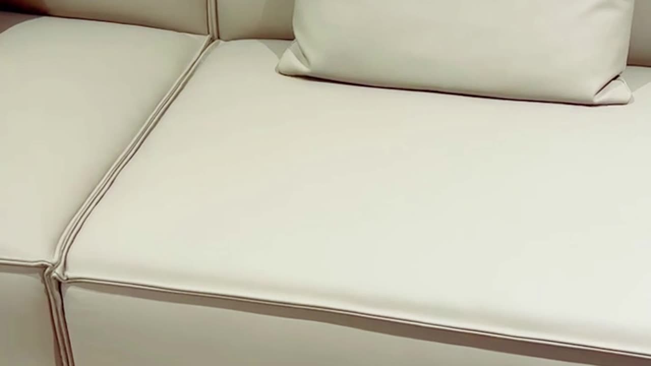 Effortless Elegance: Discover our Italian Minimalist Leather Sofa!