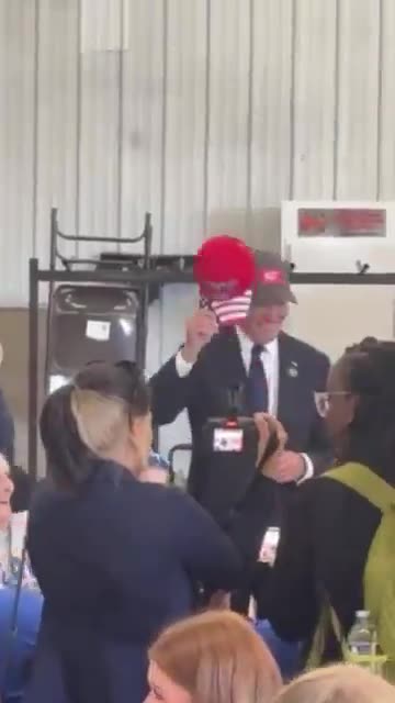 REAL VIDEO: Joe Biden puts on a Trump 2024 HAT!
