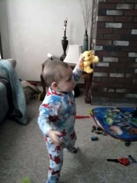 A Cute Boy Dancing On The Lion King Theme Song