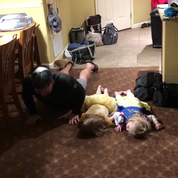 Little girls hilariously attempt to do “the worm” dance move