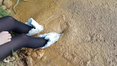 White Boots in Deep Mud