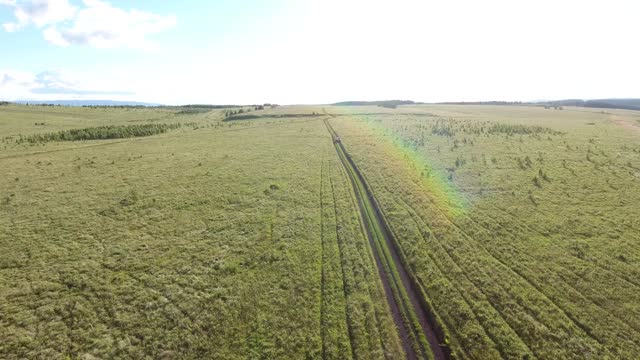 flying a drone through a field