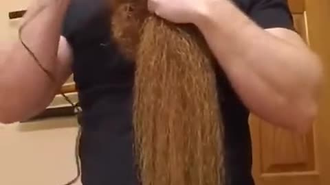 Man grew his beard for years and records himself shaving it