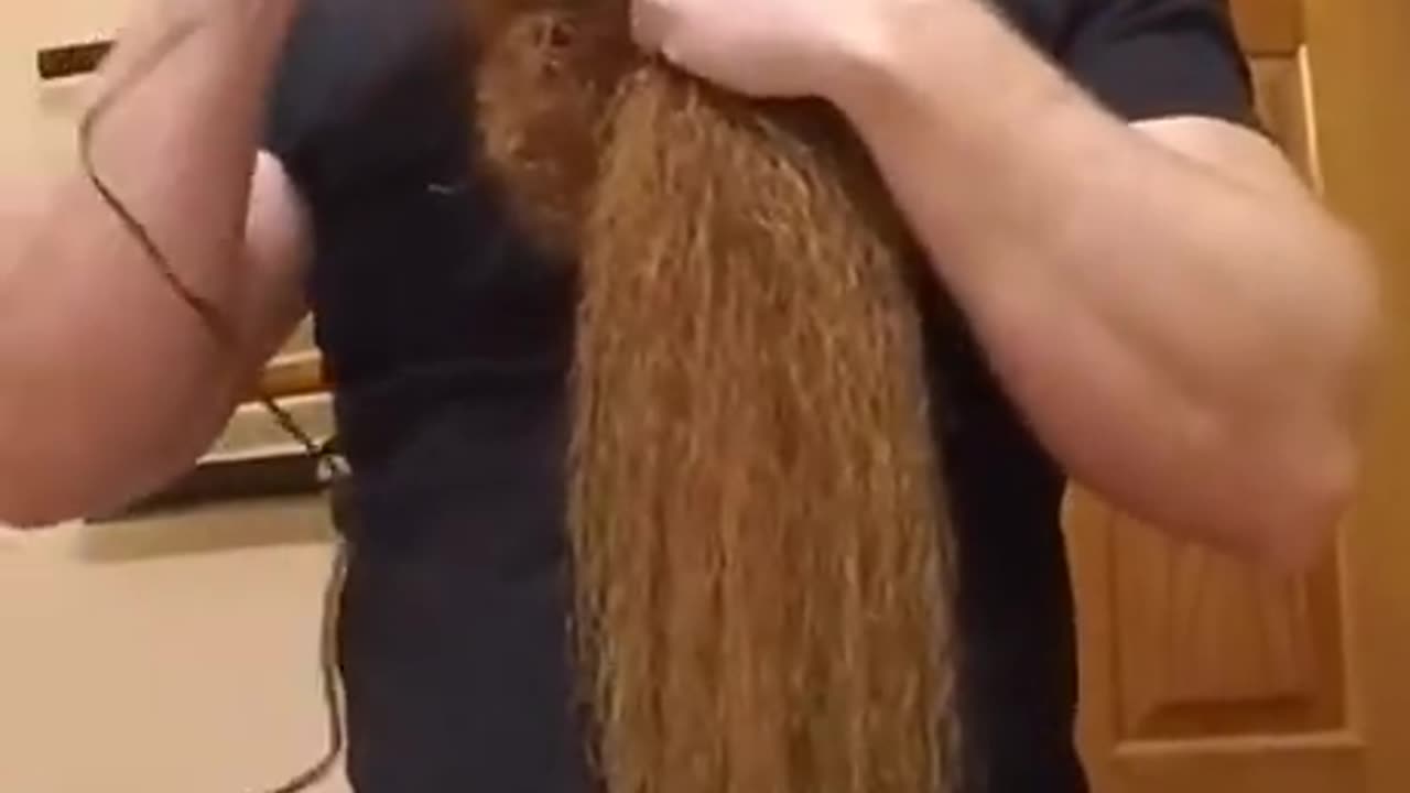 Man grew his beard for years and records himself shaving it