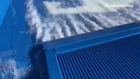 Girl red board drops into wave machine falls instantly