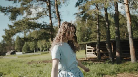 Girl moving in garden