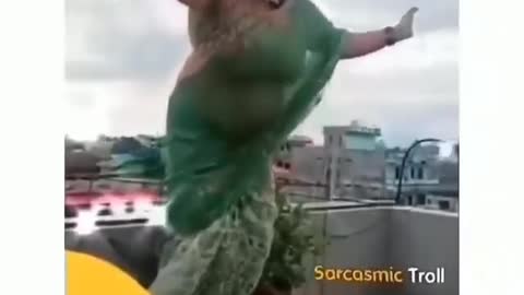 Funny Fat Woman Jumped on the roof and the result building got damaged