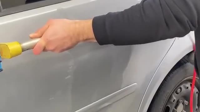 Automobile sheet metal depression repair