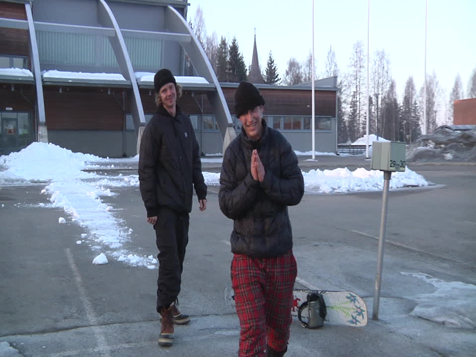 Snowboarder Turns Roof into Rail