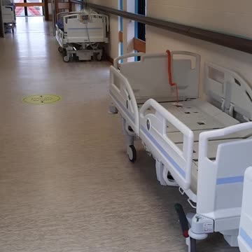 empty hospitals rows of unsused stretchers