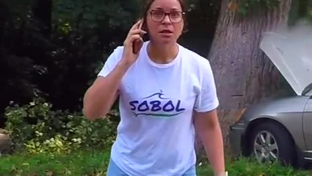 Karen tries to park a car.