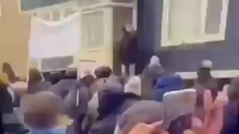 French People Throwing the Mud on member of Political Party