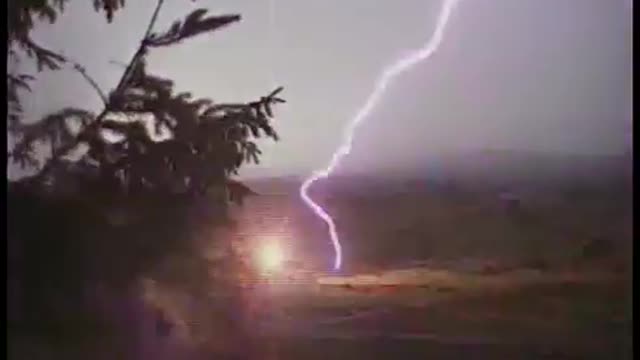 Lightning hit the big tree next to the house, it was really thrilling