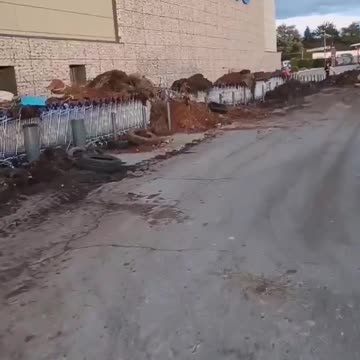 FRANCE – Angry farmers dumped manure on shopping carts