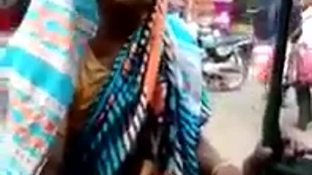 Indian beggar women speaking in english