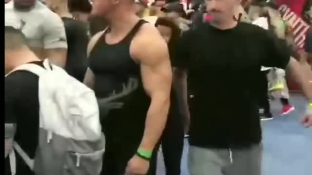 Bodybuilders Prank, Skinny guy bumping in the youngster.