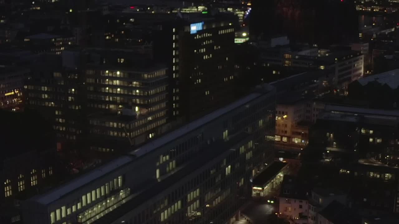 Night flight in a German city with a cathedral