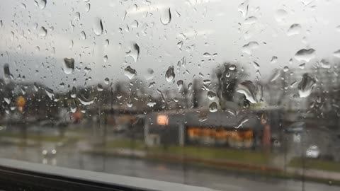 Time Lapse Video Of Cars Passing By On A Rainy Day