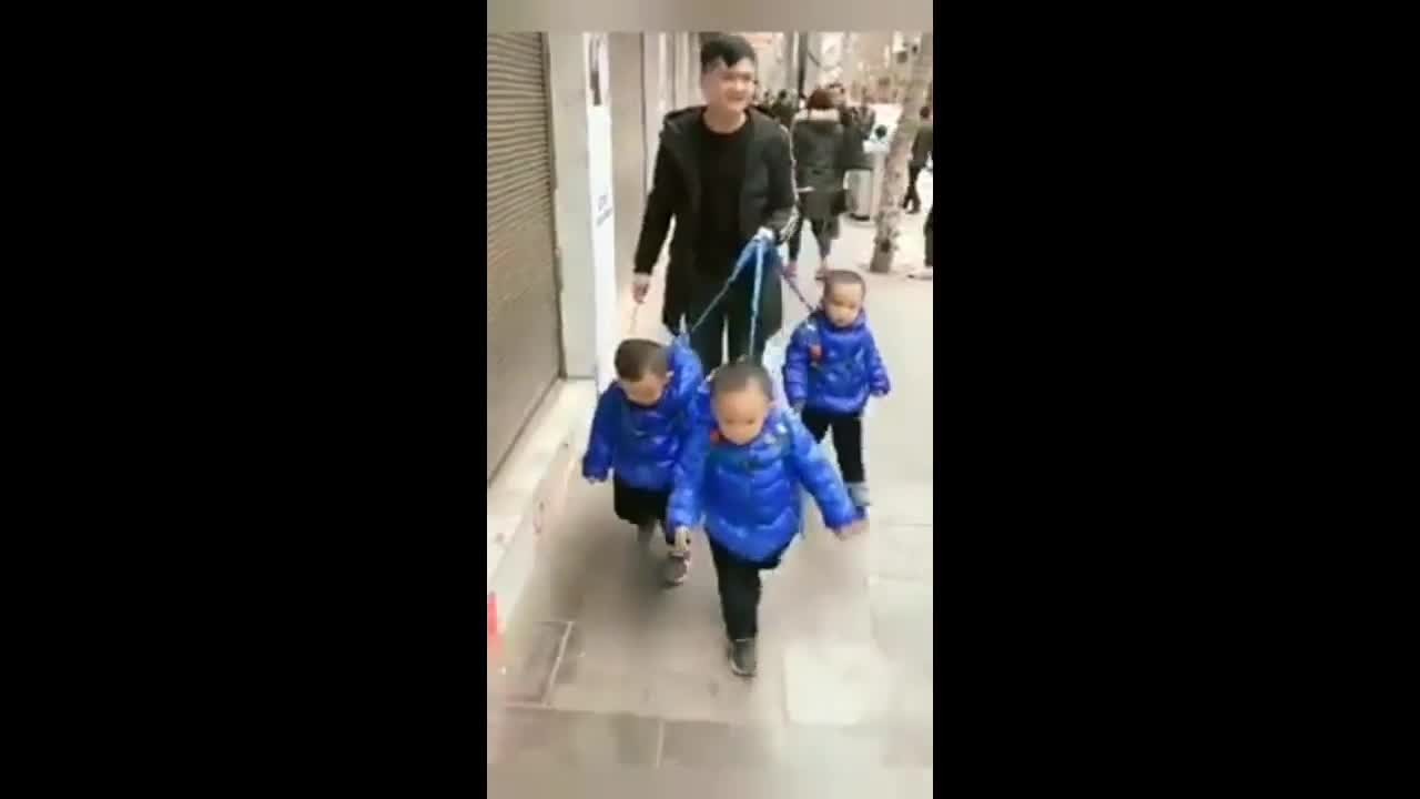 Cute naughty triples babies with busy dad