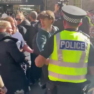 Prince Andrew confronted and heckled by a young guy during funeral march in Edinburgh.