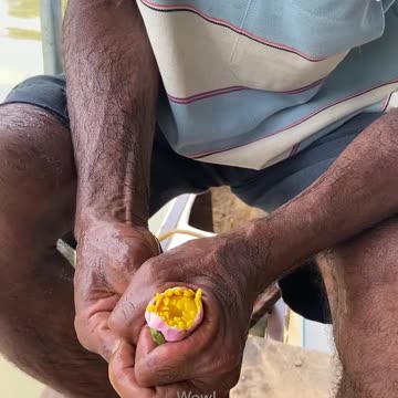 Turning a water lily into a necklace