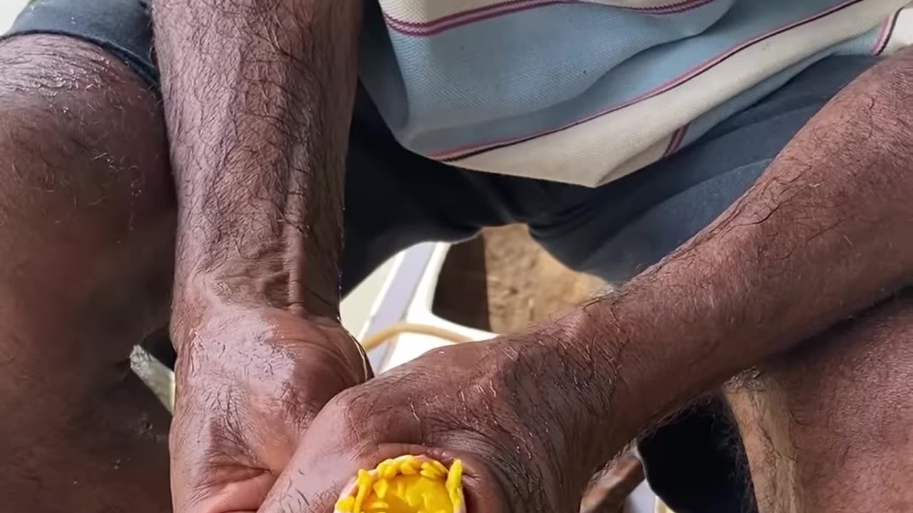 Turning a water lily into a necklace