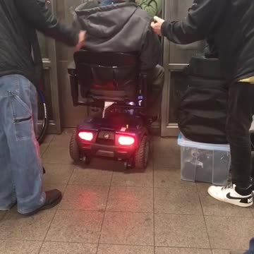 Guy in wheel chair refuses to wait for next elevator