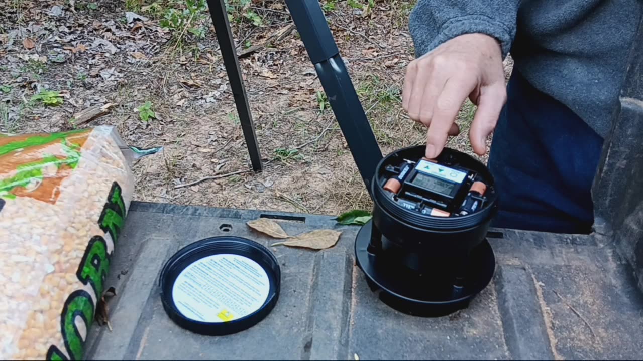 Deer feeder and trail camera setup.