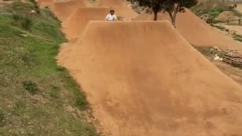 A Biker Crashed Jumping Over a Dirt Ramp & fells