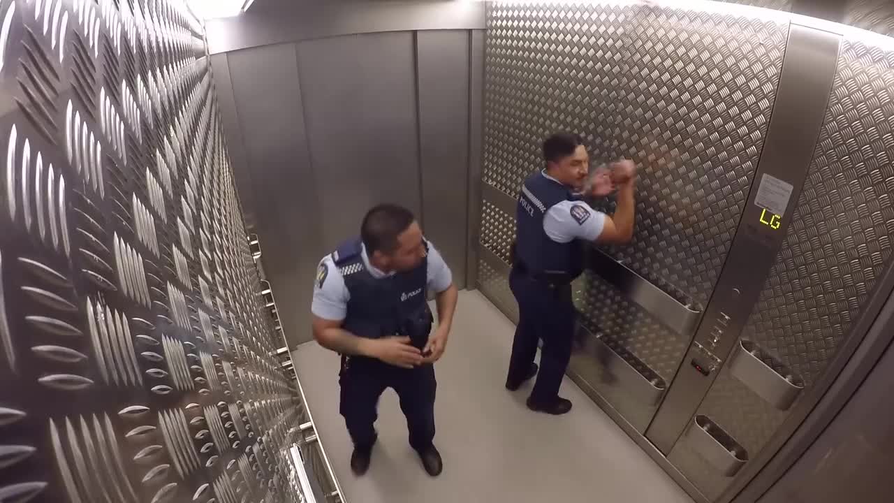 Police Officers Lay Down Amazing Beat During Elevator Ride