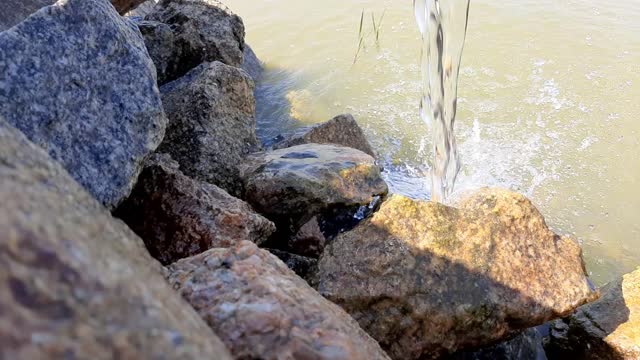 Waterfall: the sound of water falling on stones