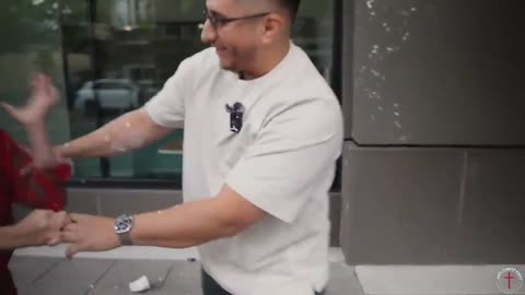 An unhinged activist assaulted a pro-lifer and threw her drink at him. Her young
