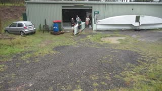 Moving the second leeward hull end