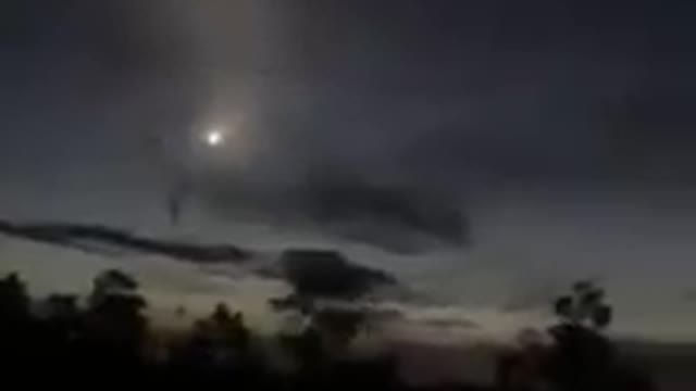 A driver filmed an unidentified object in the sky.